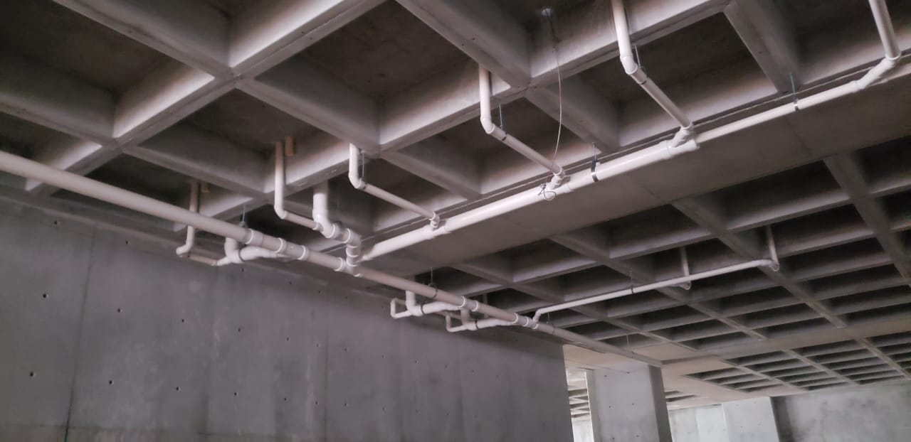 Instalación bajo losa reticular